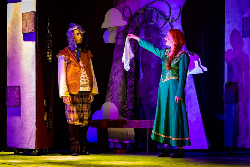 Students perform onstage
